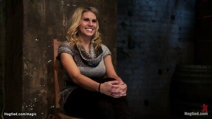 Blonde Gets Limbs Bound To Spreader Bar