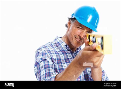Architect Using Spirit Level Portrait Of Mature Architect Using Spirit