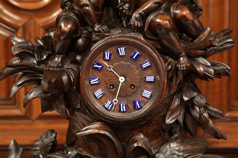 Th Century Swiss Black Forest Carved Walnut Mantel Clock With Cherubs