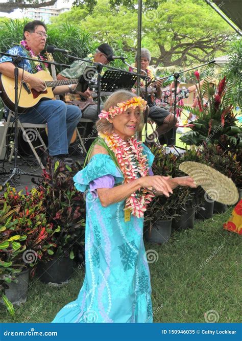 Honolulu, Hawaii - 5/2/2018 - Senior Hawaiian Woman Performing