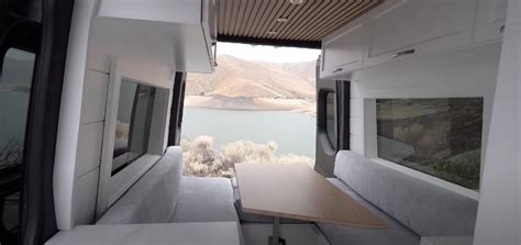 Couple Converts Sprinter Van Into A Functional Mini Beach House On