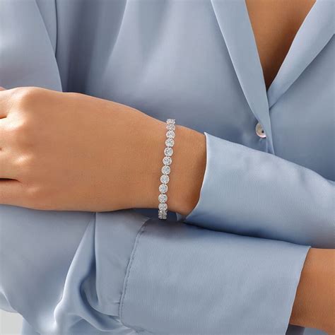 Bracelet De Tennis En Grappe De 9 Diamants De 5 02 Carats TW En Or