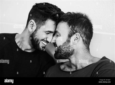 Gay Men Couple Having Tender Moment Together At Home Soft Focus On