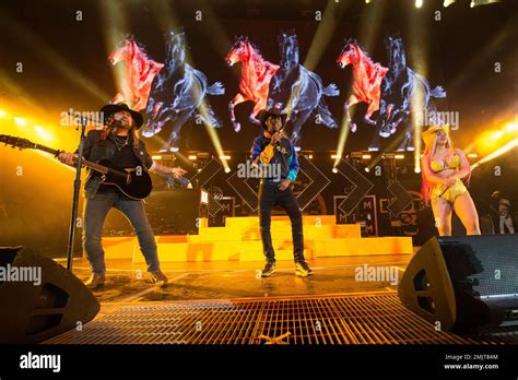 Music Artists Billy Ray Cyrus From Left Lil Nas X And Cardi B Perform At Hot Summer Jam