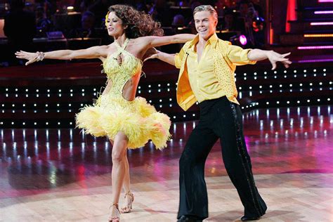 Brooke Burke Shows Off Abs In New Bikini Photos