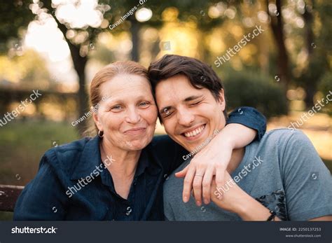 Happy Mature Mother Hugging Smiling Adult Stock Photo 2250137253