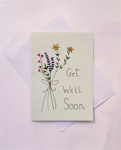 A Card With Flowers On It That Says Get Well Soon