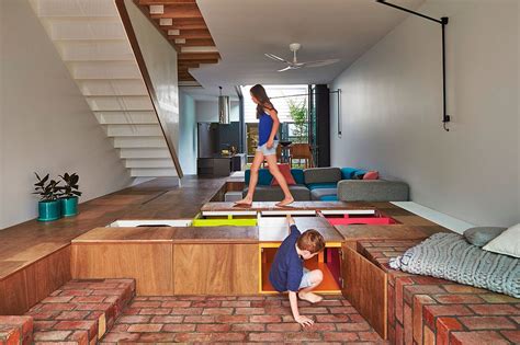 Custom Design Turns The Floor Into Toy Storage Space