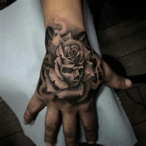 50 Skull Hand Tattoo Designs With Meaning Art And Design