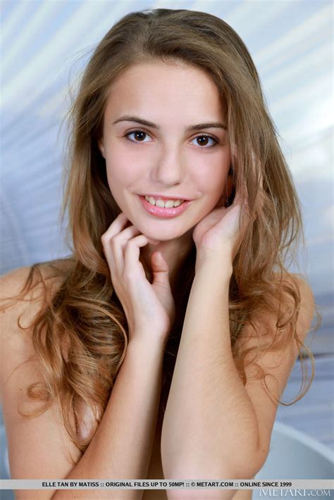 Beautiful Teen Elle Tan Removes Sensual Lingerie And Heels To Pose Bare Naked CoedCherry