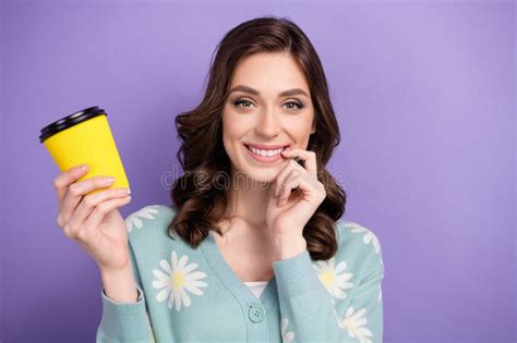 Photo Of Young Beautiful Brunette Curly Hair Lady Bite Nail Holding