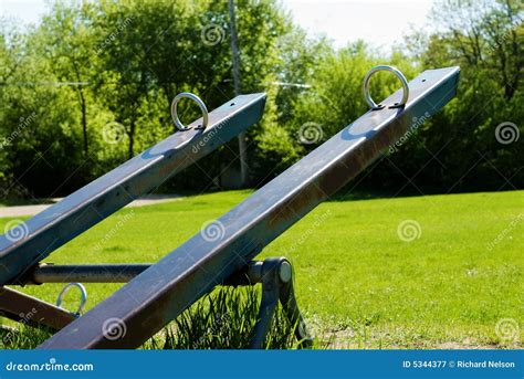 teeter totter stock image image  metal park teeter