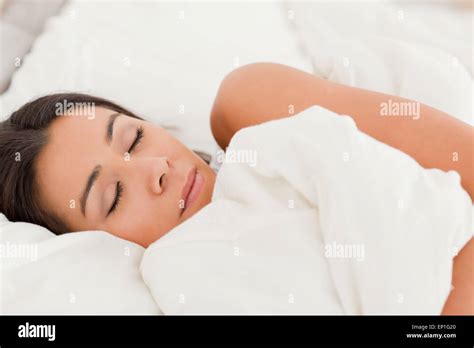 Sleeping Brunette Woman Lying Under Sheet Stock Photo Alamy