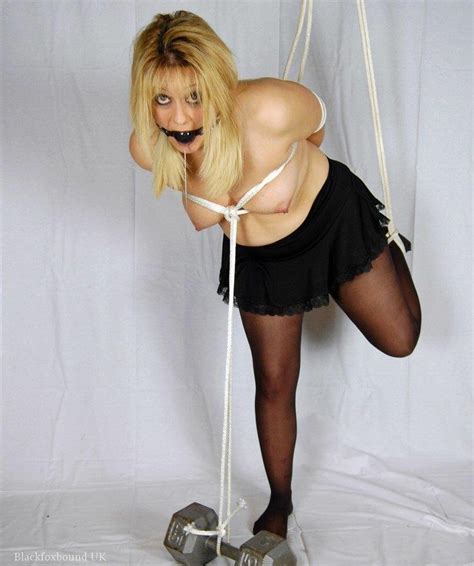 Submissive Babe In A Hot Suspension Bondage Scene 16 Photos