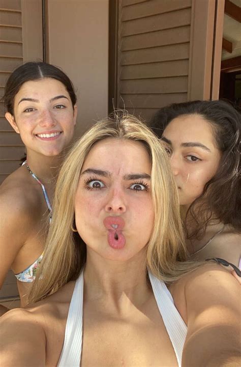 Three Women Taking A Selfie With Their Tongue Out