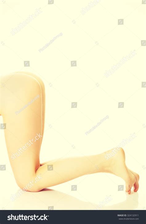 Стоковая фотография 324132911 Side View Nude Woman Legs Buttocks