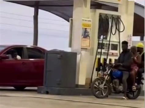 Man In Utter Disbelief As His Babe Leaves Him On Okada Hops Into Another Guys Car At Filling