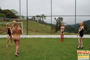 Tranny In String Bikini Playing Volley Ball XXX Dessert Picture