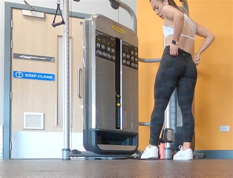 Gym Brunette In Tight Black Camo Leggings Bending Over Part Spandex Leggings Yoga Pants