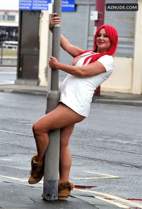 Lisa Appleton Sexy In A Red Wig For Local Sex Shop Saint And Sinners Photo Shoot In Blackpool