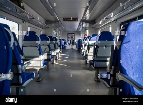 Interior of modern passenger high-speed express train. Inside the train carriage Stock Photo - Alamy