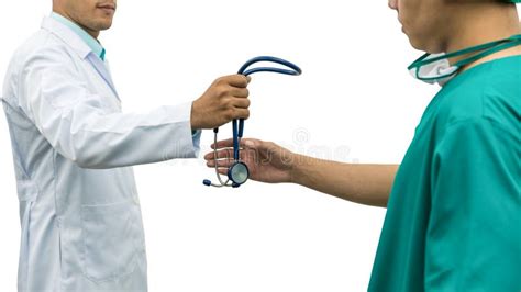 Doctor Giving Stethoscope To Surgeon Referral Stock Image Image Of