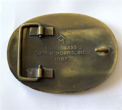 Vintage 1987 Philip Morris Solid Brass Belt Buckle Gem