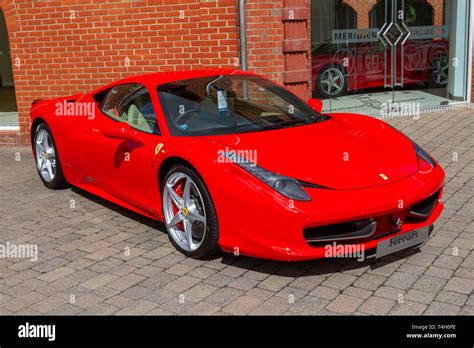 Red Ferrari 458 Italia (2011) outside Meridien Modena, Official Ferrari ...