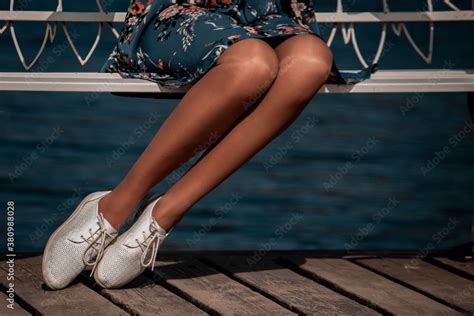 Shiny Nude Pantyhose On A Beautiful Woman Legs Girl On A Bench Stock Photo Adobe Stock