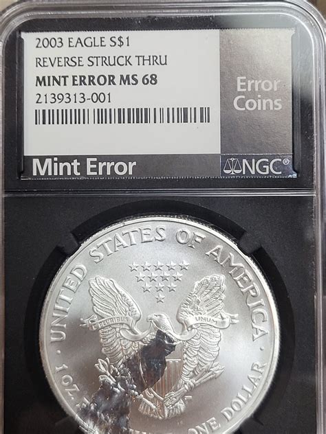 MASSIVE ERROR! 2003 Silver Eagle NGC MINT ERROR MS68 Reverse Struck