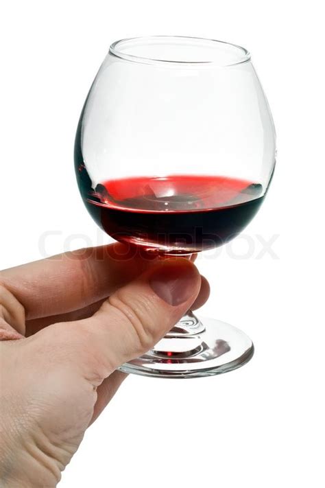 A small glass of red wine | Stock Photo | Colourbox