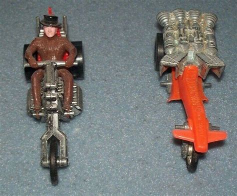 Two Vintage Hot Wheels Rumblers Including Romain Candle