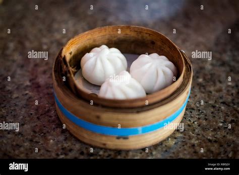 Fresh Steamed Traditional Thai Stuffed Buns In Local Restaurant In