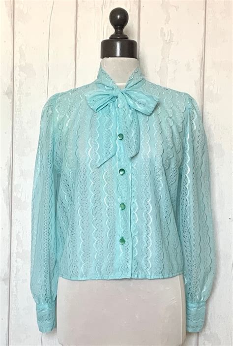 Original 1960s 70s Pale Blue Lace Pussy Bow Tie Blouse Gem