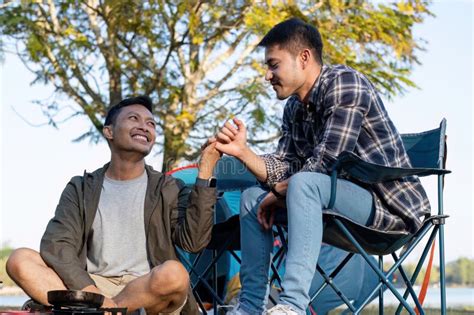 Happy Asian Male Gay Couple On Camping Together In A Forest Romantic Vocation Trip Stock Image