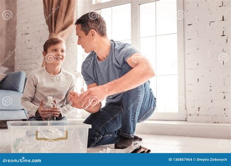 Blonde Haired Son Listening To His Father Attentively Stock Photo Image Of Educated Schoolkid