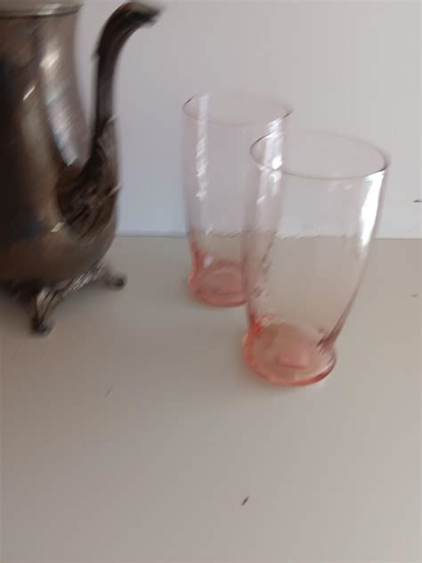Silver Plate Oneida Pitcher With Four Pink Toned Drinking Glasses