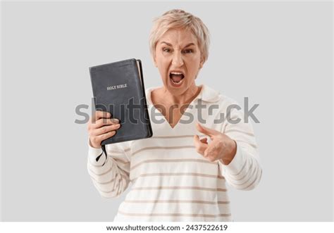 Angry Mature Woman Holy Bible Pointing Stock Photo 2437522619 Shutterstock