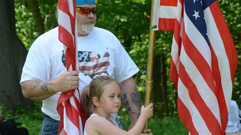 Fort Custer National Cemetery filled with those honoring the fallen