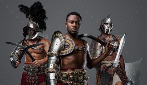 Black Gladiator With Naked Torso With Two Comrades Stock Photo By Fxquadro