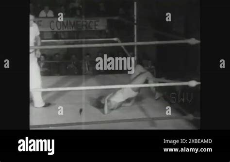 1950s A Blonde Wins A Female Wrestling Match And The Loser Exits The Ring Stock Video Footage