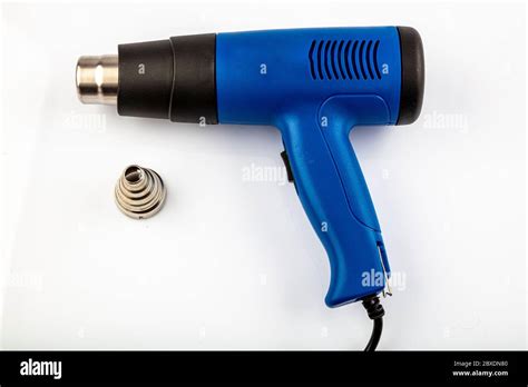 Industrial Heat Gun Hot Air Gun With Nozzles Isolated On White Background Stock Photo Alamy