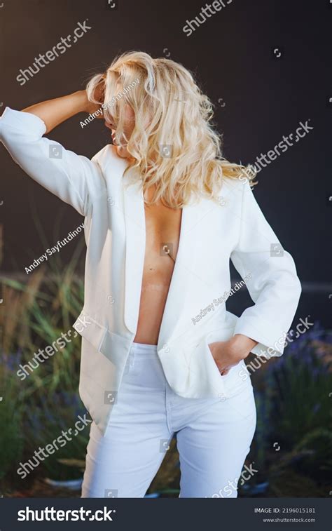 Middleaged Woman Blonde White Pantsuit Topless Stock Photo Shutterstock