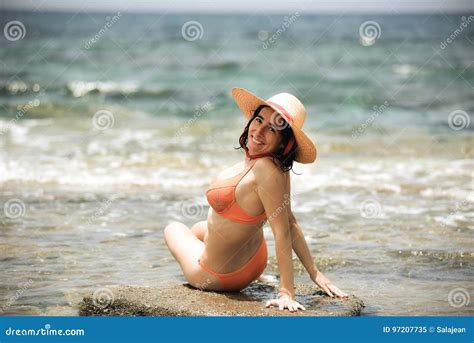 Bikini Tanning Woman Relaxing On The Beach With A Hat Stock Image Image Of Female Ocean