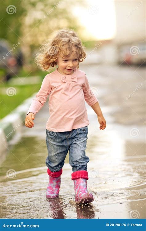 Child In Puddle Stock Photo Image Of Enjoyment Happiness 20198176