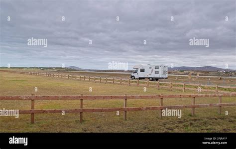 Empty Country Road With Caravan Camper Van Donegal Ireland Stock