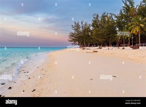 Beautiful Remote Tropical Beach With White Sand And Sea Shells In The