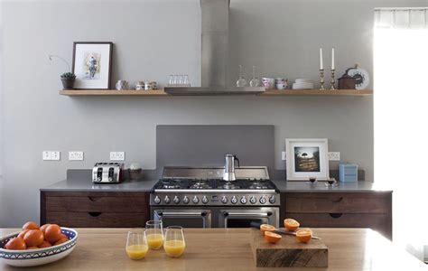 Open Shelving And Stainless Cooker Hood And Splash Back Create Focal