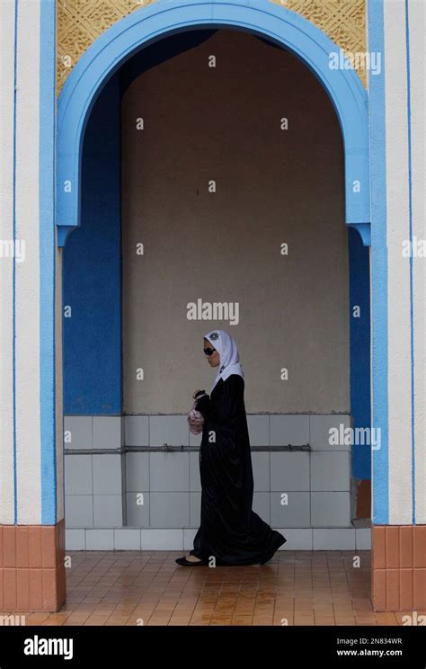 A Filipino Muslim Woman Walks At The Blue Mosque At The Maharlika