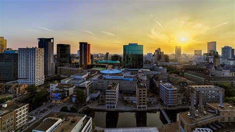 Rotterdam Bij Zonsondergang Van Roy Poots Op Canvas Behang En Meer